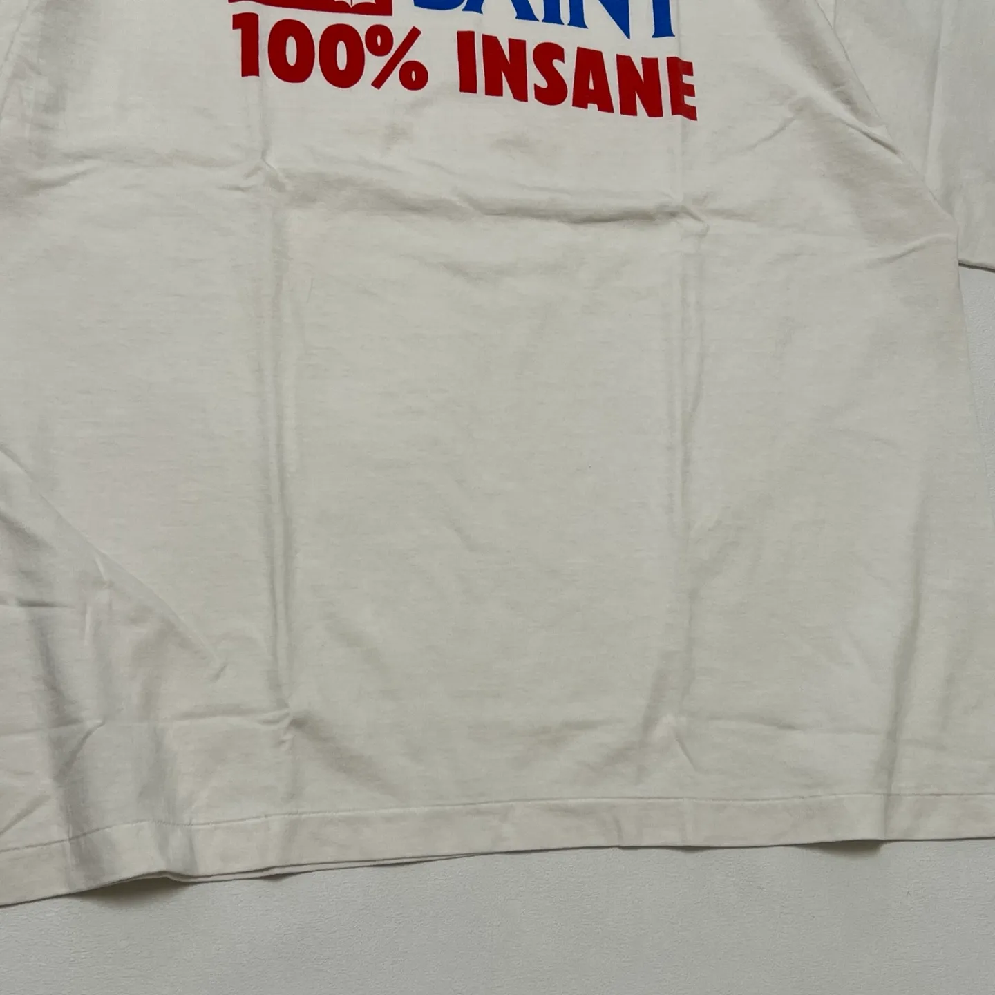 SAINT Mxxxxxx INSANE SS TEE/WHT Little Devil Angel TEE 100% INSANE slogan printed short sleeves off-white S-XL tube-woven fabric without side seams OE yarn original same weight correct version original main mark/wash mark/little angel security code original development no touch printing
